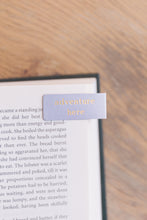 Load image into Gallery viewer, Adventure Here Embossed Magnetic Bookmark
